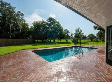 This stunningly remodeled 4/3 pool home in the highly on Lone Palm Golf Club in Florida - for sale on GolfHomes.com, golf home, golf lot