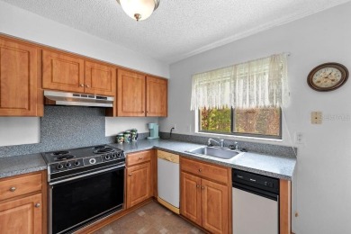 Welcome to your serene second-floor retreat in the heart of on Heather Golf and Country Club in Florida - for sale on GolfHomes.com, golf home, golf lot