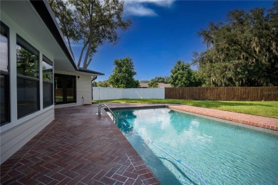 This stunningly remodeled 4/3 pool home in the highly on Lone Palm Golf Club in Florida - for sale on GolfHomes.com, golf home, golf lot