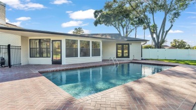 This stunningly remodeled 4/3 pool home in the highly on Lone Palm Golf Club in Florida - for sale on GolfHomes.com, golf home, golf lot