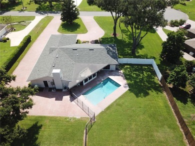 This stunningly remodeled 4/3 pool home in the highly on Lone Palm Golf Club in Florida - for sale on GolfHomes.com, golf home, golf lot