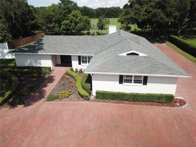 This stunningly remodeled 4/3 pool home in the highly on Lone Palm Golf Club in Florida - for sale on GolfHomes.com, golf home, golf lot