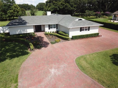 This stunningly remodeled 4/3 pool home in the highly on Lone Palm Golf Club in Florida - for sale on GolfHomes.com, golf home, golf lot