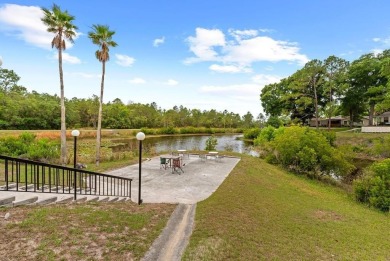 Welcome to your serene second-floor retreat in the heart of on Heather Golf and Country Club in Florida - for sale on GolfHomes.com, golf home, golf lot