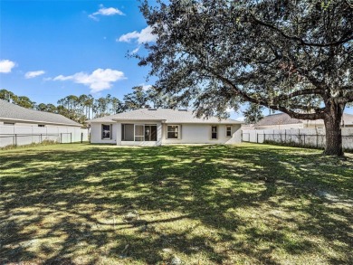 Better Than New! 3 Bed, 2 Bath Home with Screened Porch and on The Grand Club Cypress Course in Florida - for sale on GolfHomes.com, golf home, golf lot