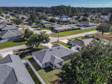 Better Than New! 3 Bed, 2 Bath Home with Screened Porch and on The Grand Club Cypress Course in Florida - for sale on GolfHomes.com, golf home, golf lot