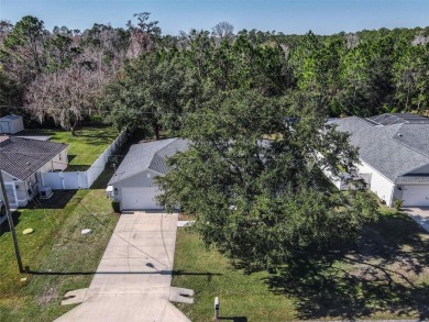 Better Than New! 3 Bed, 2 Bath Home with Screened Porch and on The Grand Club Cypress Course in Florida - for sale on GolfHomes.com, golf home, golf lot