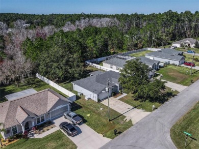 Better Than New! 3 Bed, 2 Bath Home with Screened Porch and on The Grand Club Cypress Course in Florida - for sale on GolfHomes.com, golf home, golf lot