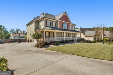 Experience luxury living in this expansive 5,300+ sq ft, 6BR/5BA on Mirror Lake Golf Club in Georgia - for sale on GolfHomes.com, golf home, golf lot