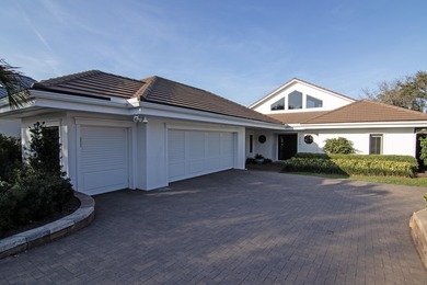 Upscale single-story estate located on the 16th hole of on  in Florida - for sale on GolfHomes.com, golf home, golf lot