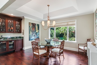 Upscale single-story estate located on the 16th hole of on  in Florida - for sale on GolfHomes.com, golf home, golf lot