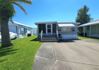 LOOKING FOR A FLORIDA GETAWAY? This cheerful one bed, 1 1/2 bath on River Run Golf Links in Florida - for sale on GolfHomes.com, golf home, golf lot