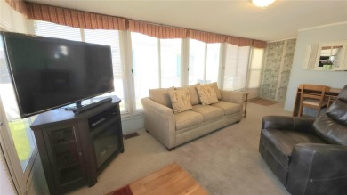 LOOKING FOR A FLORIDA GETAWAY? This cheerful one bed, 1 1/2 bath on River Run Golf Links in Florida - for sale on GolfHomes.com, golf home, golf lot