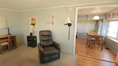 LOOKING FOR A FLORIDA GETAWAY? This cheerful one bed, 1 1/2 bath on River Run Golf Links in Florida - for sale on GolfHomes.com, golf home, golf lot