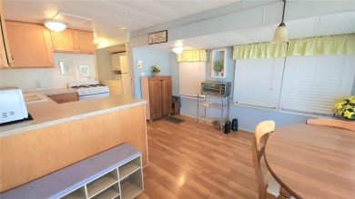 LOOKING FOR A FLORIDA GETAWAY? This cheerful one bed, 1 1/2 bath on River Run Golf Links in Florida - for sale on GolfHomes.com, golf home, golf lot