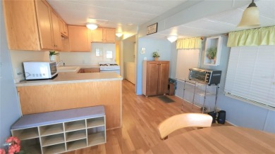 LOOKING FOR A FLORIDA GETAWAY? This cheerful one bed, 1 1/2 bath on River Run Golf Links in Florida - for sale on GolfHomes.com, golf home, golf lot