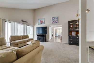 Charming 3-bedroom, 2-bath home with 1,464 sq ft of living space on Beacon Woods Golf Club in Florida - for sale on GolfHomes.com, golf home, golf lot