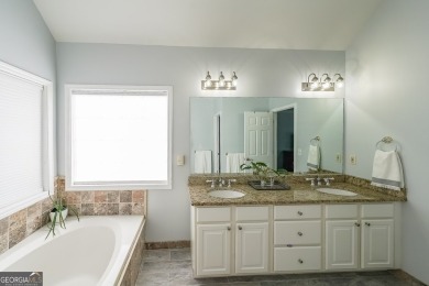 Discover this charming residence nestled in the sought-after on Bridgemill Golf Club in Georgia - for sale on GolfHomes.com, golf home, golf lot
