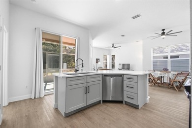 Beautifully updated home in the Gated Intracoastal front, Golf on Grand Haven Golf Club in Florida - for sale on GolfHomes.com, golf home, golf lot