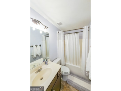 Discover this charming residence nestled in the sought-after on Bridgemill Golf Club in Georgia - for sale on GolfHomes.com, golf home, golf lot