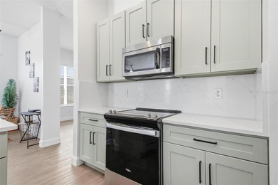 Beautifully updated home in the Gated Intracoastal front, Golf on Grand Haven Golf Club in Florida - for sale on GolfHomes.com, golf home, golf lot