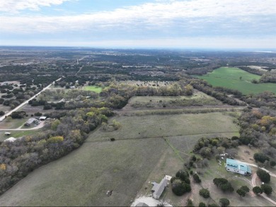 Embrace the potential of this vast 9.971-acre vacant lot in Hill on White Bluff Resort - New Course in Texas - for sale on GolfHomes.com, golf home, golf lot