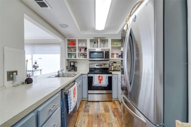 Charming 3-bedroom, 2-bath home with 1,464 sq ft of living space on Beacon Woods Golf Club in Florida - for sale on GolfHomes.com, golf home, golf lot