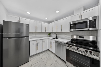 Thoughtfully updated with high-end finishes throughout, this on Palm-Aire Country Club and Resort - Palms in Florida - for sale on GolfHomes.com, golf home, golf lot
