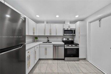 Thoughtfully updated with high-end finishes throughout, this on Palm-Aire Country Club and Resort - Palms in Florida - for sale on GolfHomes.com, golf home, golf lot