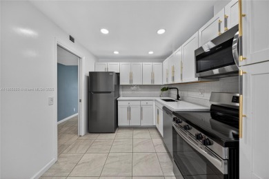 Thoughtfully updated with high-end finishes throughout, this on Palm-Aire Country Club and Resort - Palms in Florida - for sale on GolfHomes.com, golf home, golf lot