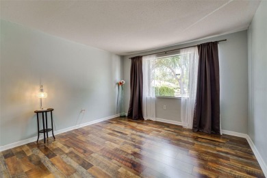 Charming 3-bedroom, 2-bath home with 1,464 sq ft of living space on Beacon Woods Golf Club in Florida - for sale on GolfHomes.com, golf home, golf lot