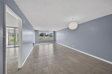 Thoughtfully updated with high-end finishes throughout, this on Palm-Aire Country Club and Resort - Palms in Florida - for sale on GolfHomes.com, golf home, golf lot
