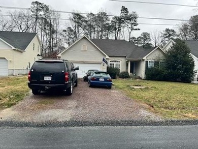 Home in a nice community with golf course, marina, small beach on Captains Cove Golf and Yacht Club in Virginia - for sale on GolfHomes.com, golf home, golf lot