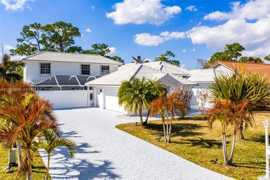 Beautiful 2 story courtyard pool home in the gated community of on St. Lucie Trail Golf Club in Florida - for sale on GolfHomes.com, golf home, golf lot
