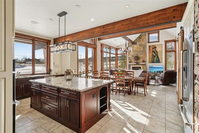 Spectacular custom-built home located in the highly sought-after on Raven Golf Club At Three Peaks in Colorado - for sale on GolfHomes.com, golf home, golf lot