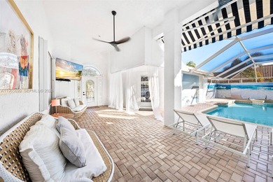 Beautiful 2 story courtyard pool home in the gated community of on St. Lucie Trail Golf Club in Florida - for sale on GolfHomes.com, golf home, golf lot