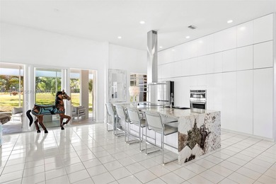 Beautiful 2 story courtyard pool home in the gated community of on St. Lucie Trail Golf Club in Florida - for sale on GolfHomes.com, golf home, golf lot