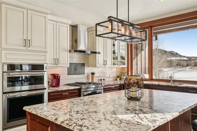Spectacular custom-built home located in the highly sought-after on Raven Golf Club At Three Peaks in Colorado - for sale on GolfHomes.com, golf home, golf lot