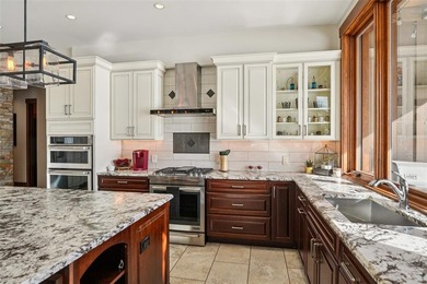 Spectacular custom-built home located in the highly sought-after on Raven Golf Club At Three Peaks in Colorado - for sale on GolfHomes.com, golf home, golf lot