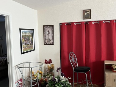 This well-maintained 3-bedroom home features a functional layout on Spanish Lakes I in Florida - for sale on GolfHomes.com, golf home, golf lot