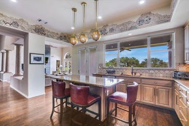 ATTENTION GOLFERS! Custom 1-story Mediterranean by Dick Clark on on Palmer Lakeside At Barton Creek in Texas - for sale on GolfHomes.com, golf home, golf lot