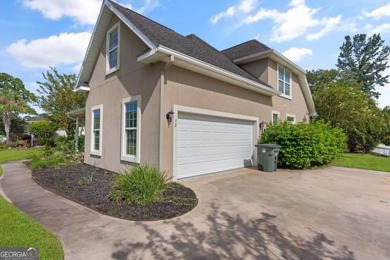 Discover an immaculate 5-bedroom, 3-bath lakefront home in on Laurel Island Links in Georgia - for sale on GolfHomes.com, golf home, golf lot