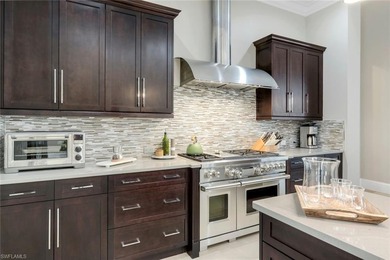 Isla Del Sol in award-winning Fiddler's Creek is like no other on The Rookery At Marco in Florida - for sale on GolfHomes.com, golf home, golf lot