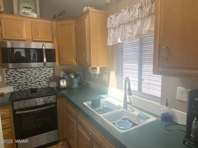 LOCATION is Everything at Juniper Ridge Resort! This spacious on Juniper Ridge R.V. Golf Resort in Arizona - for sale on GolfHomes.com, golf home, golf lot