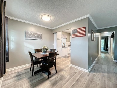 Impressive and charming! You're going to love this updated 2 on Summertree Golf Course in Florida - for sale on GolfHomes.com, golf home, golf lot
