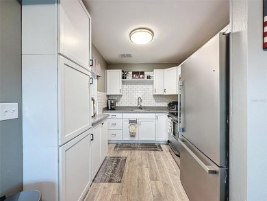 Impressive and charming! You're going to love this updated 2 on Summertree Golf Course in Florida - for sale on GolfHomes.com, golf home, golf lot