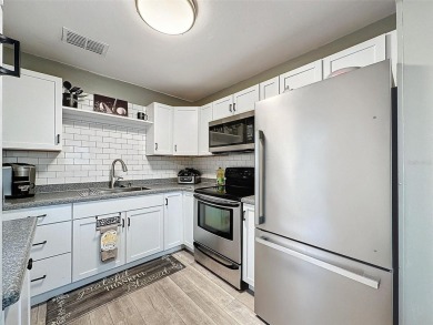Impressive and charming! You're going to love this updated 2 on Summertree Golf Course in Florida - for sale on GolfHomes.com, golf home, golf lot