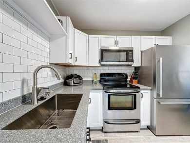 Impressive and charming! You're going to love this updated 2 on Summertree Golf Course in Florida - for sale on GolfHomes.com, golf home, golf lot