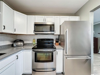 Impressive and charming! You're going to love this updated 2 on Summertree Golf Course in Florida - for sale on GolfHomes.com, golf home, golf lot