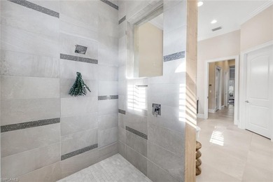 Isla Del Sol in award-winning Fiddler's Creek is like no other on The Rookery At Marco in Florida - for sale on GolfHomes.com, golf home, golf lot